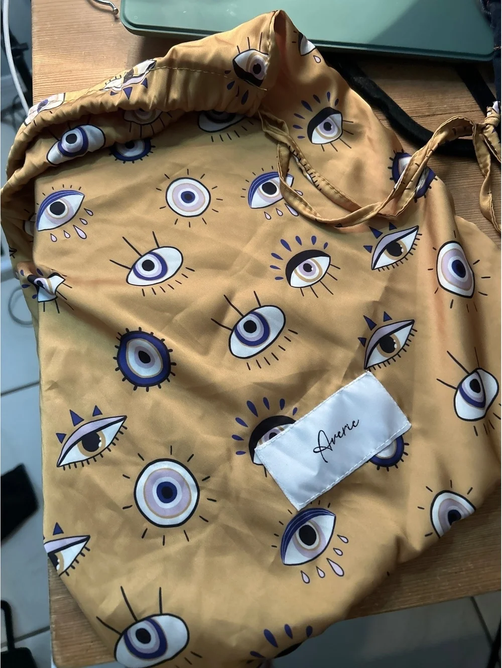 Avere Mustard Yellow Drawstring Bag with Eye Print